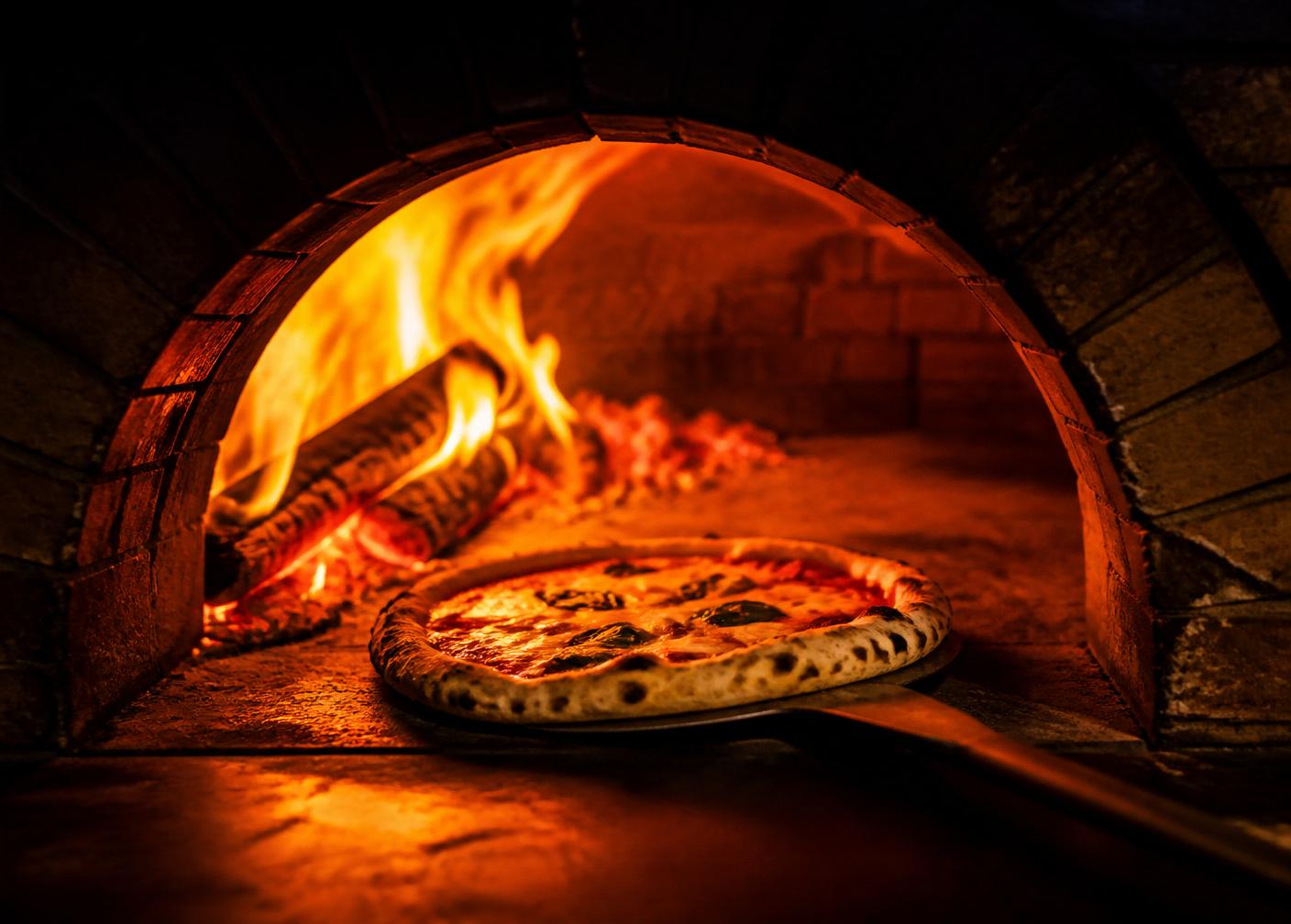 Brick oven with roaring fire